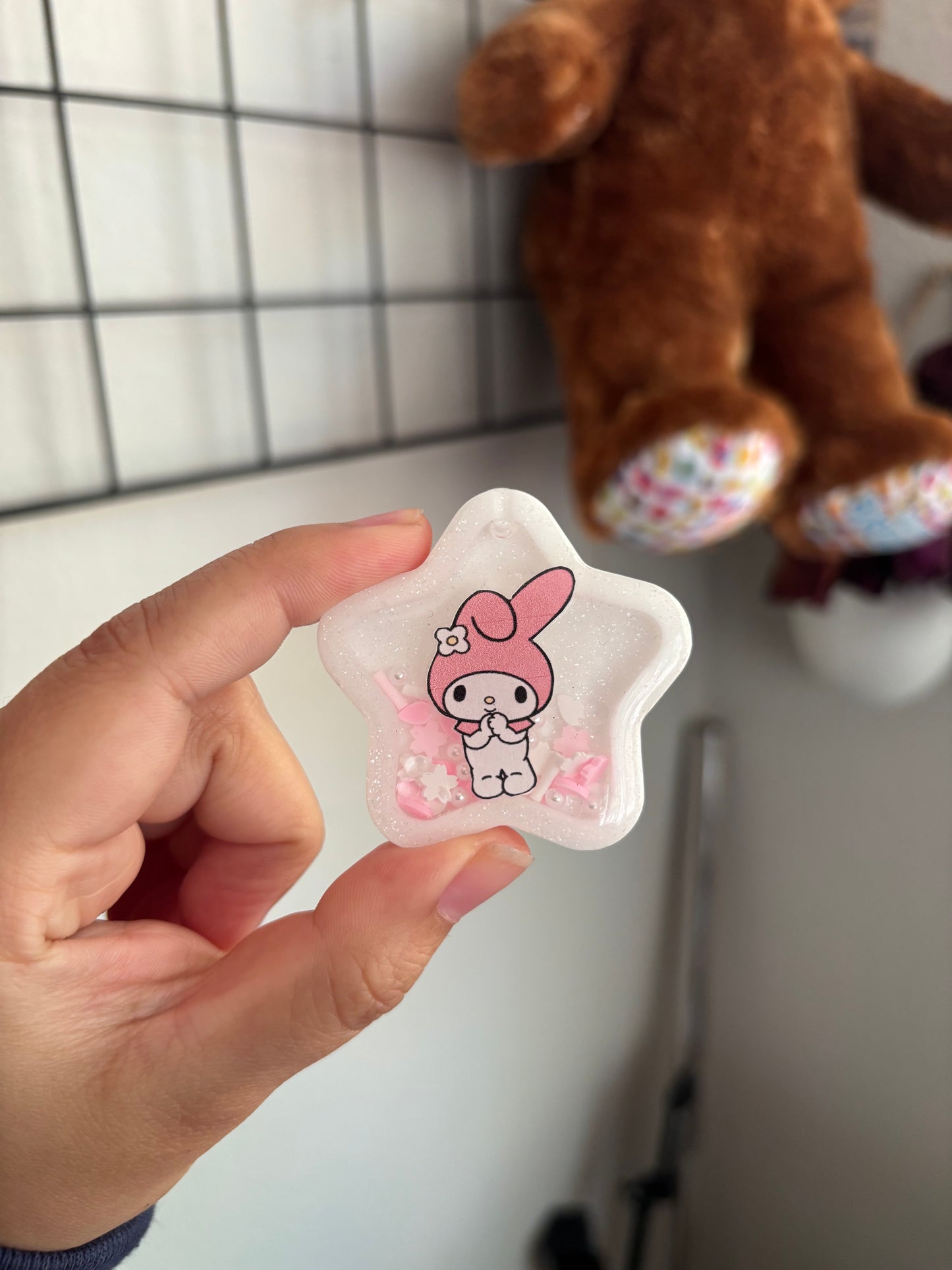 Sanrio badge reel