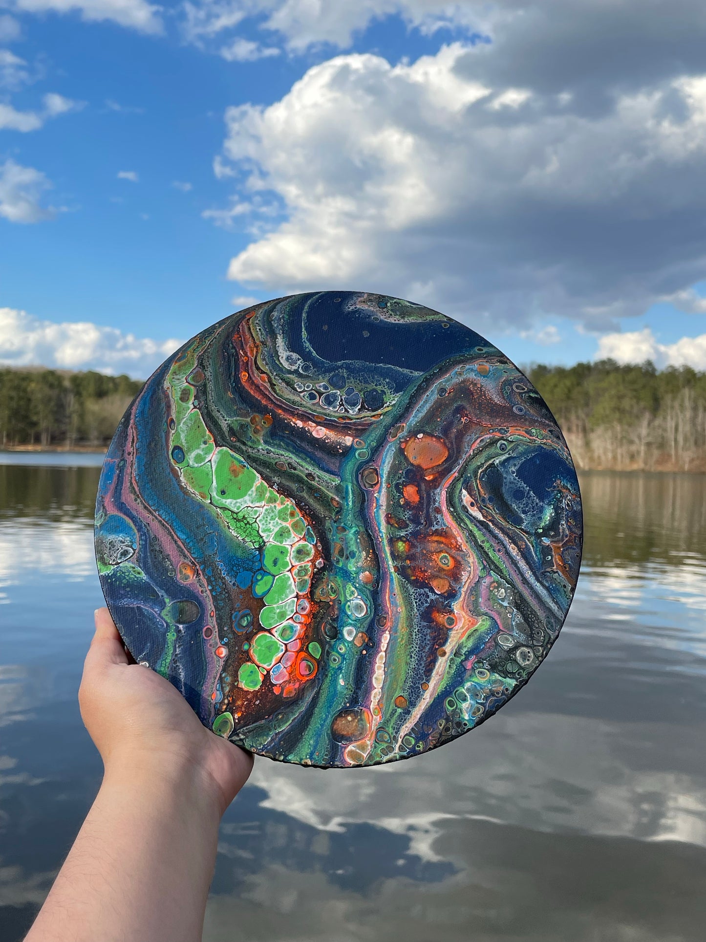 Abstract acrylic pour on round canvas “The Earth”