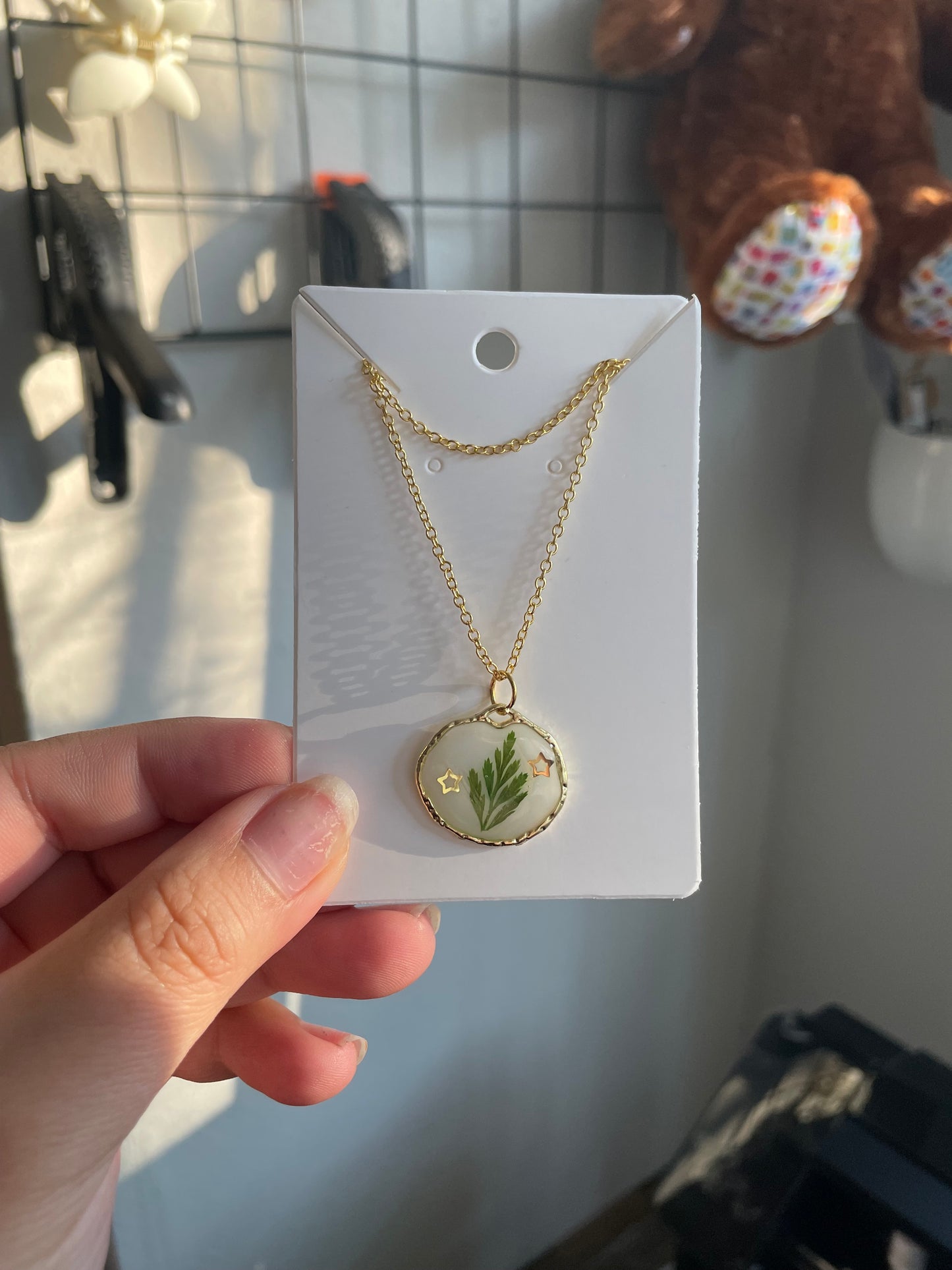 Gold plant necklaces