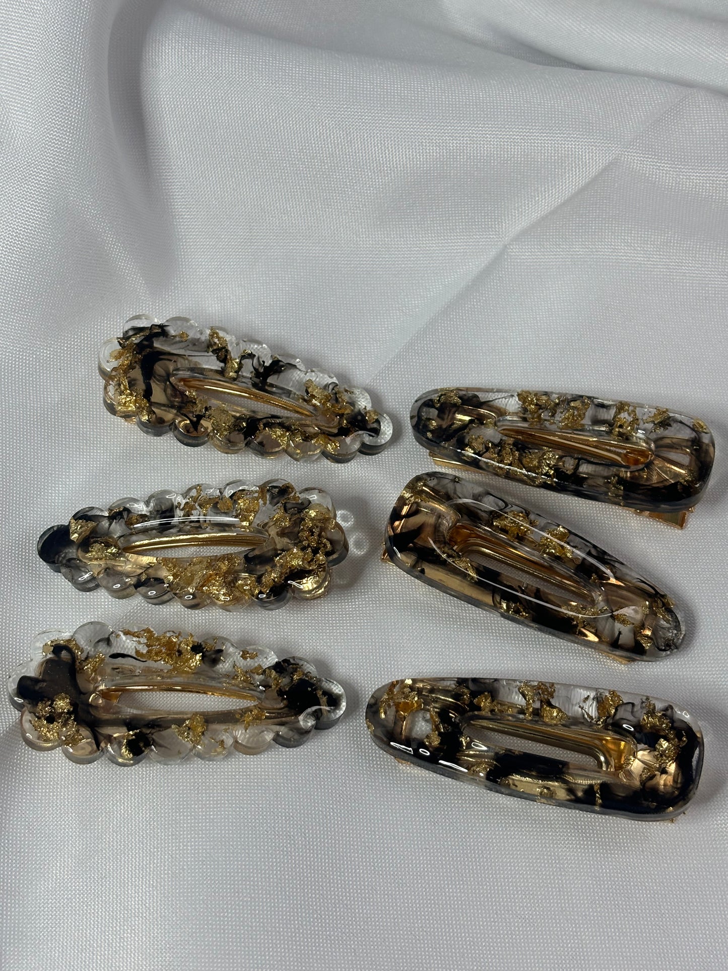 Black & goldflake hair clips