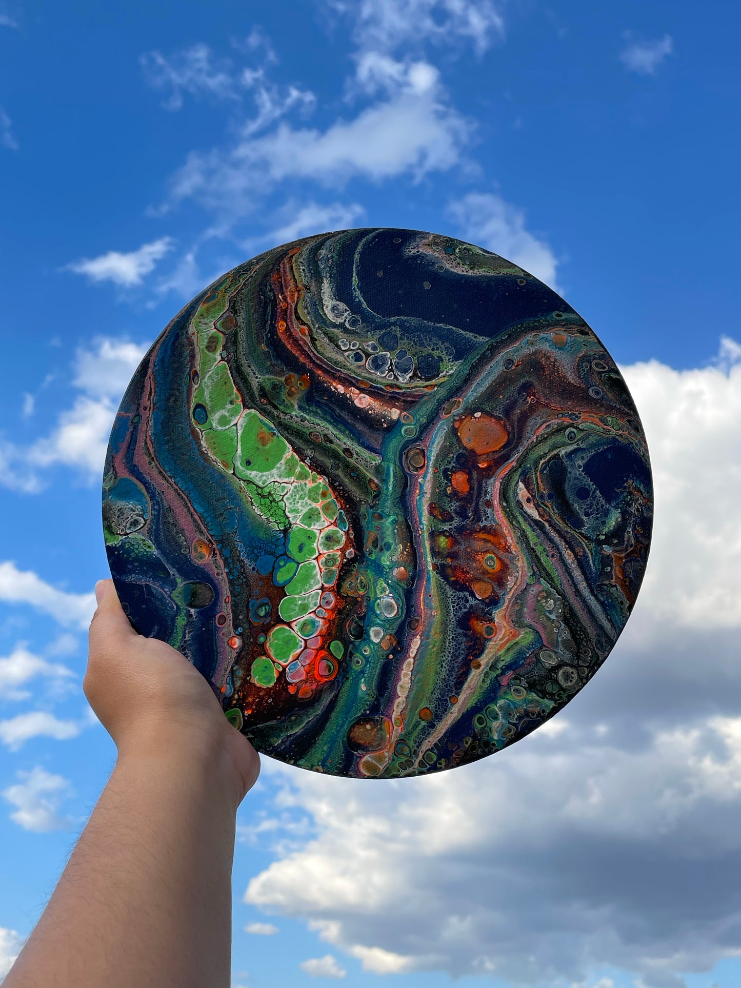 Abstract acrylic pour on round canvas “The Earth”